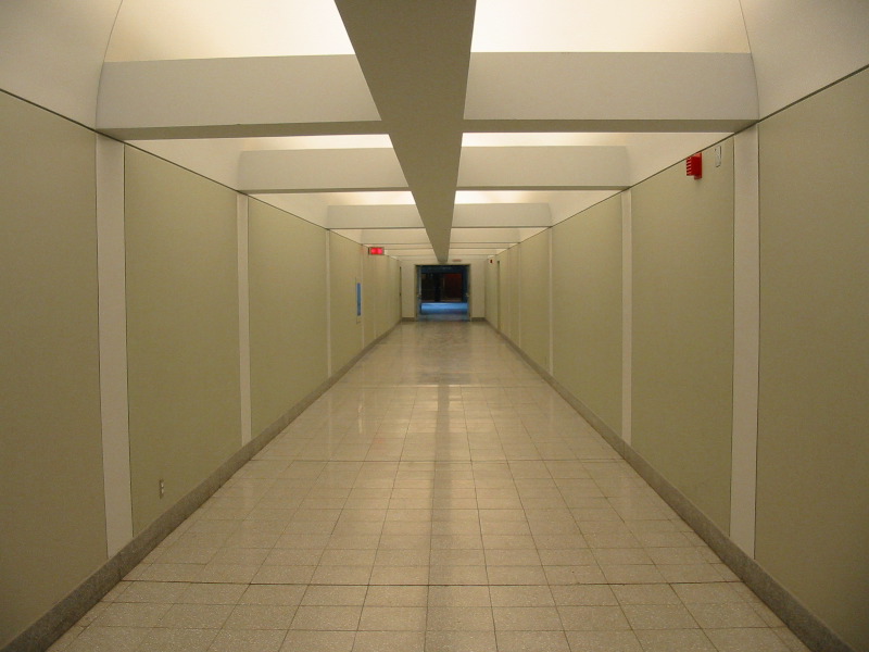 We can cross the room to reach Bell Center from this corridor.
