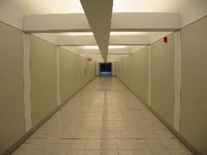 We can cross the room to reach Bell Center from this corridor.