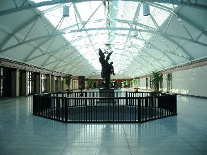 Called "Salle des pas perdus" (Translate as you will : Room of lost steps or Room of the ones not that are not lost). Look at the beautiful glass roof !